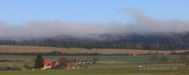 in der Sonne schwindender Nebel